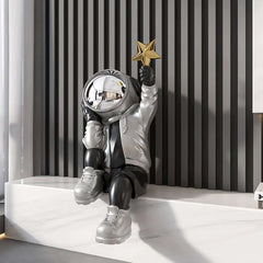 Modern Resin Astronaut Sculpture with Gold Star - Black & Silver Finish