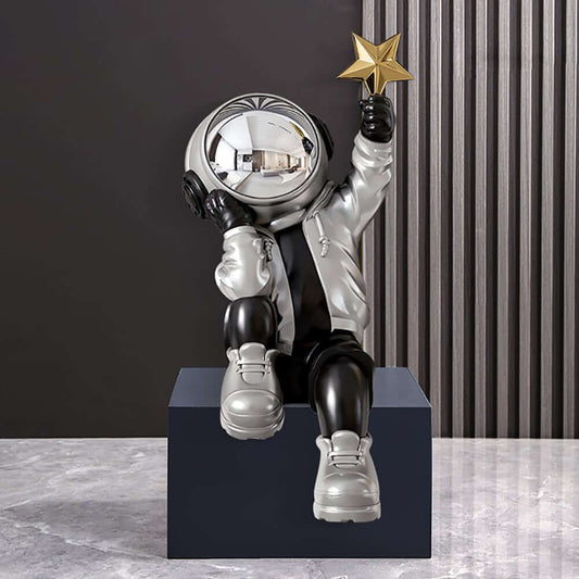 Modern Resin Astronaut Sculpture with Gold Star - Black & Silver Finish Main Product Image