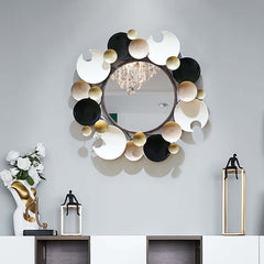 Modern Round Wall Mirror with Gold Metal Frame and Multicolor Accents Main Product Image