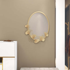 Oval Gold Accent Mirror with Sculpted Ginkgo Leaf Frame