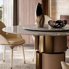 Sculptural Marble Dining Table with Lazy Susan and Warm Metallic Pedestal