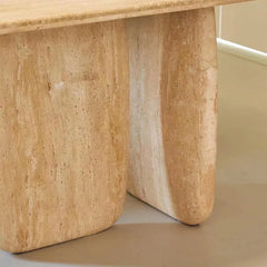 Sculptural Oval Travertine Dining Table with Warm Neutral Stone Base