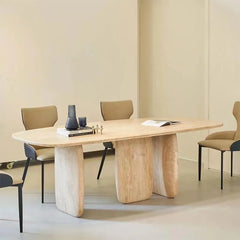 Sculptural Oval Travertine Dining Table with Warm Neutral Stone Base