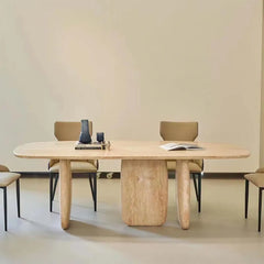 Sculptural Oval Travertine Dining Table with Warm Neutral Stone Base Main Product Image