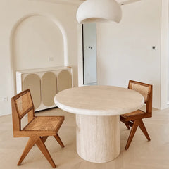 Sculptural Round Travertine Dining Table in Warm Beige, Spacious Pedestal Design