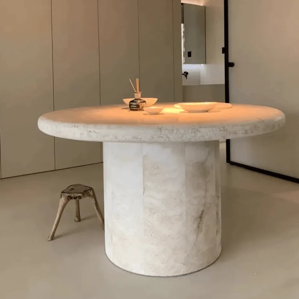 Sculptural Round Travertine Dining Table in Warm Beige, Spacious Pedestal Design