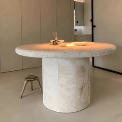 Sculptural Round Travertine Dining Table in Warm Beige, Spacious Pedestal Design