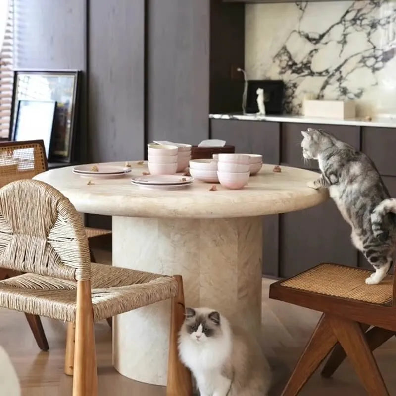 Sculptural Round Travertine Dining Table in Warm Beige, Spacious Pedestal Design