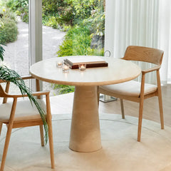 Sculptural Round Travertine Dining Table with Easy-Care Stone Look