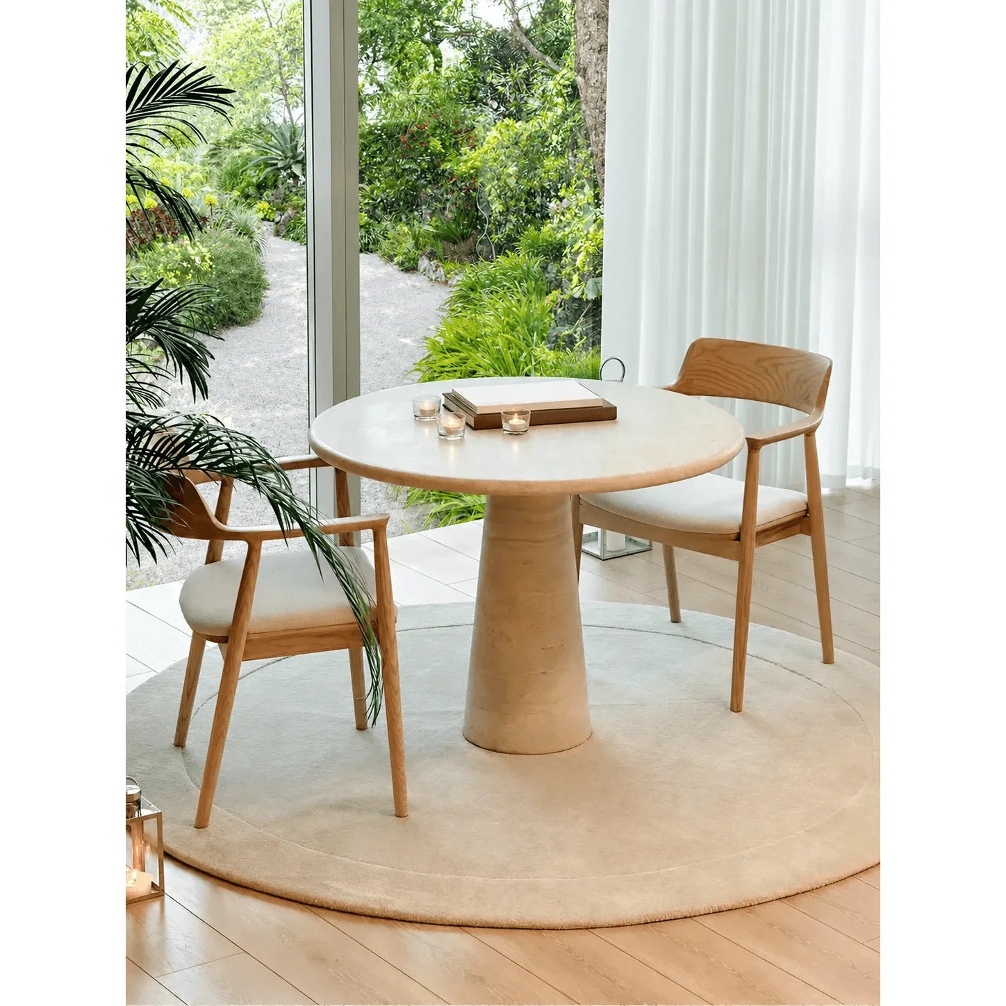 Sculptural Round Travertine Dining Table with Easy-Care Stone Look