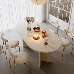 Sculptural Travertine Dining Table with Rounded Edges and Warm Stone Texture
