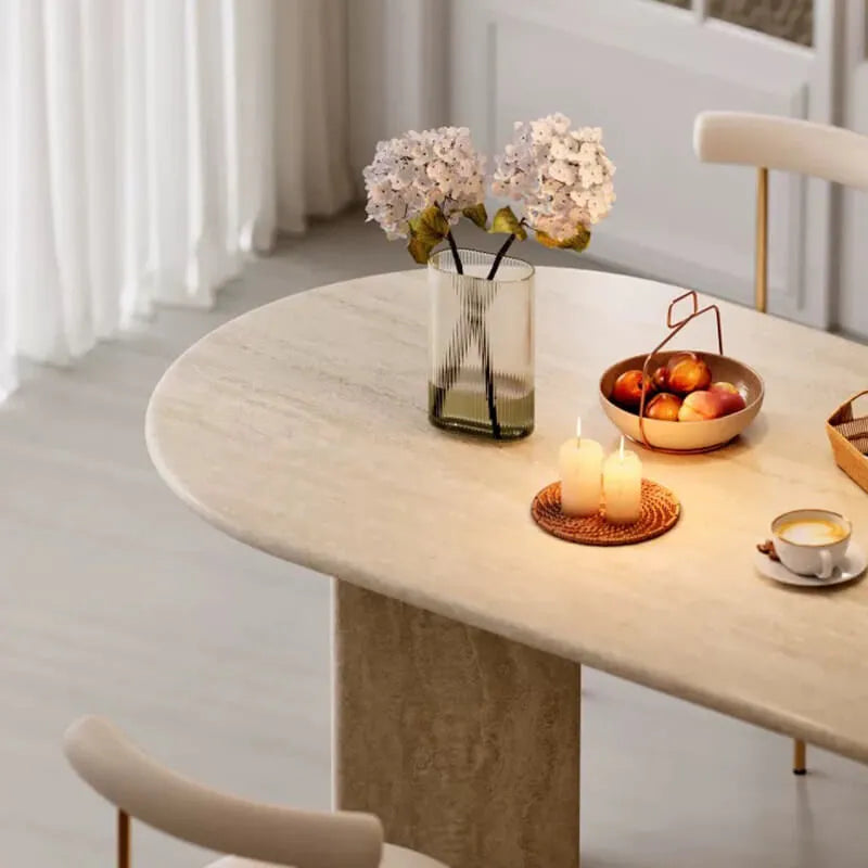 Sculptural Travertine Dining Table with Rounded Edges and Warm Stone Texture