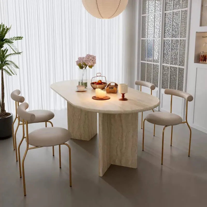 Sculptural Travertine Dining Table with Rounded Edges and Warm Stone Texture