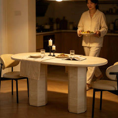 Sculptural Travertine Dining Table with Rounded Top and Double Pedestal Base